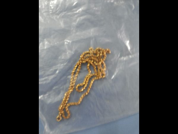 Gold chain excretes from chain snatcher