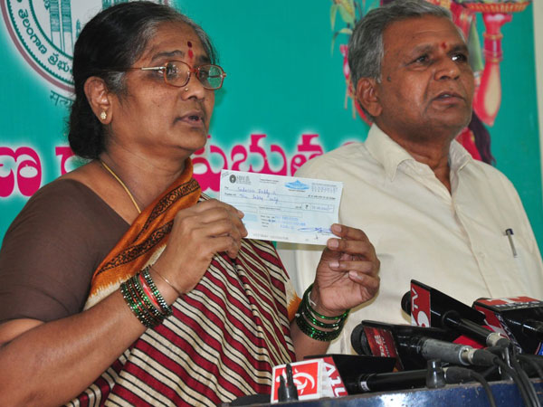 ktr hands over 10 lakh cheque to gokul bomb blast sufferers ktr hands over 10 lakh cheque to gokul bomb blast sufferers