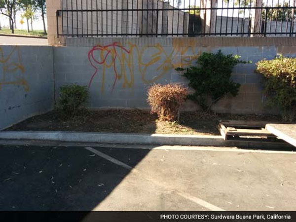 Gurudwara vandalized in US, anti-ISIS graffiti on its walls Gurudwara vandalized in US, anti-ISIS graffiti on its walls