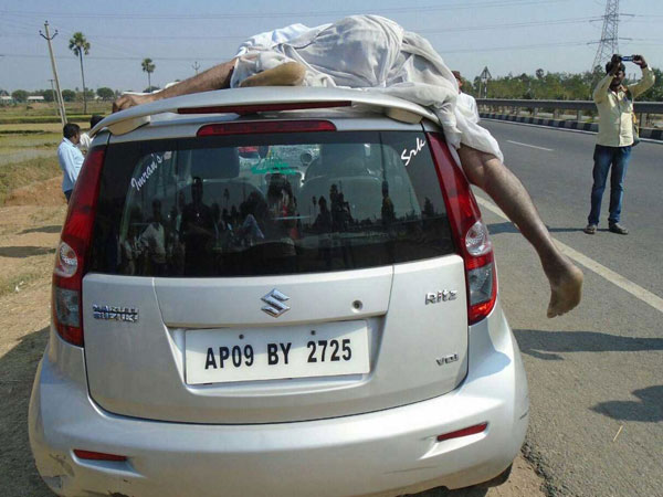 Car hits Man, carries body for 20 KM