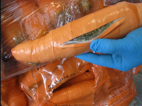 US Police say that nearly 3,000 packages were mixed in with real carrots US Police say that nearly 3,000 packages were mixed in with real carrots