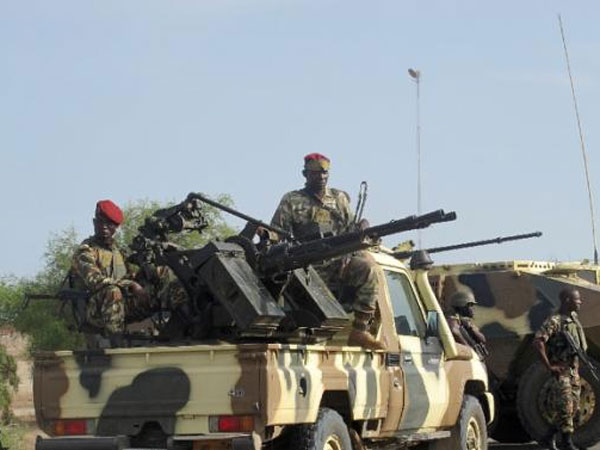 Suicide bombers kill 32 in north Cameroon market in Nigeria Suicide bombers kill 32 in north Cameroon market in Nigeria