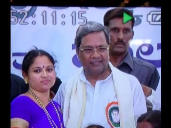 Woman kissed CM Siddaramaiah in a program by Karnataka Pradesh