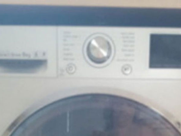 Woman accidentally posts topless selfie in rave online review of her new washing machine Woman accidentally posts topless selfie in rave online review of her new washing machine