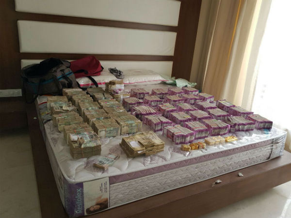 The raids are said to have taken place at the homes of two senior bureaucrats The raids are said to have taken place at the homes of two senior bureaucrats