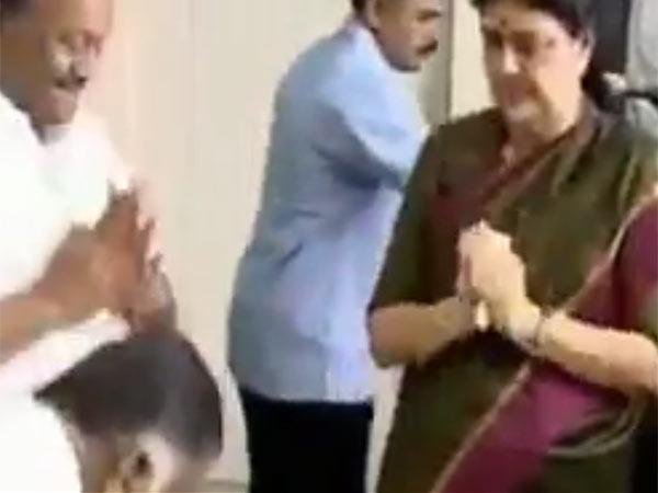 A video of Tamil Nadu Chief Minsiter Panneerselvam seeking Sasikala's blessing