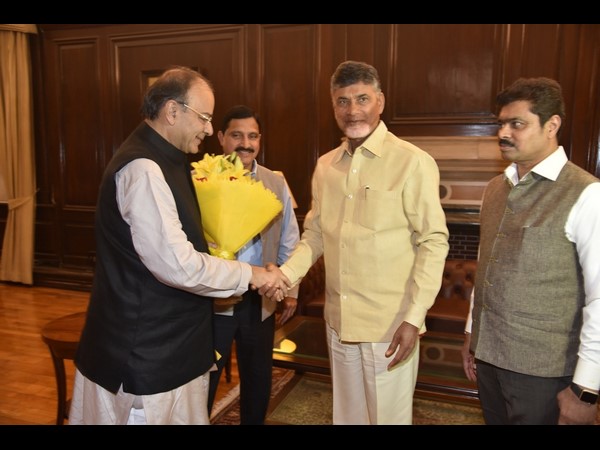 కేంద్రం ఇచ్చిన హామీలను నెరవేర్చాలి