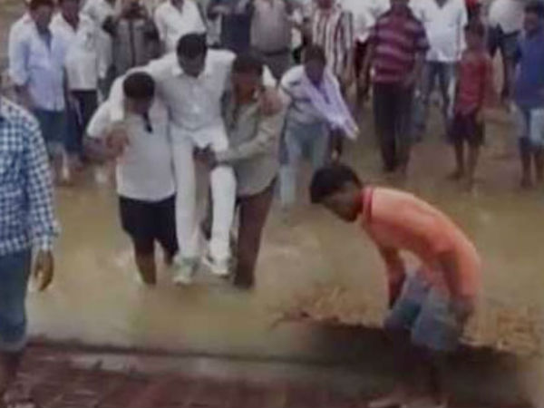 Odisha MLA Manas Madkami does a Shivraj, crosses mud in supporters’ arms