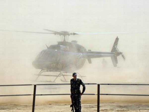 మంత్రి హెలికాప్టర్ కు వర్షం దెబ్బ...