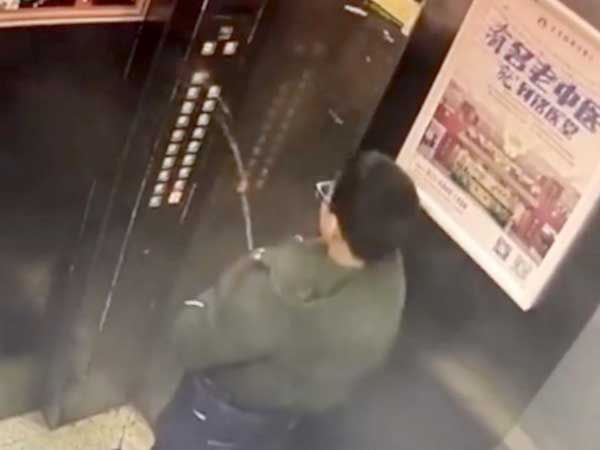 Boy gets trapped in lift in China after peeing on control buttons Boy gets trapped in lift in China after peeing on control buttons