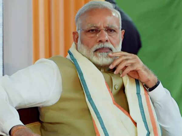 మోడీ అరాచకాలను ప్రశ్నిస్తే కేసులు