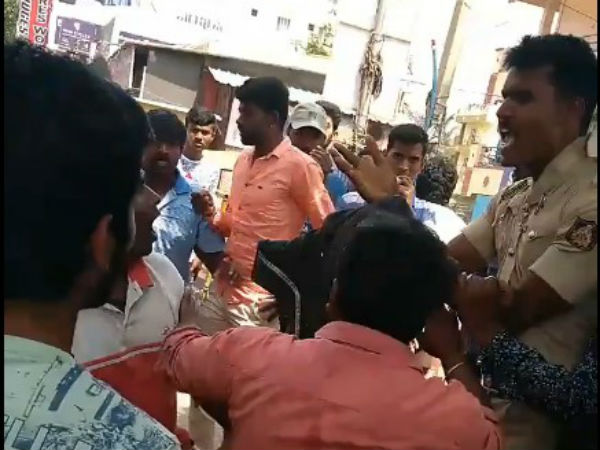 Four people arrested in connection with thrashing a cop in Benagaluru Four people arrested in connection with thrashing a cop in Benagaluru