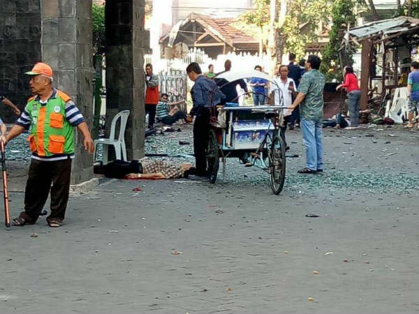 At least 10 killed in 3 church bombings in Indonesia