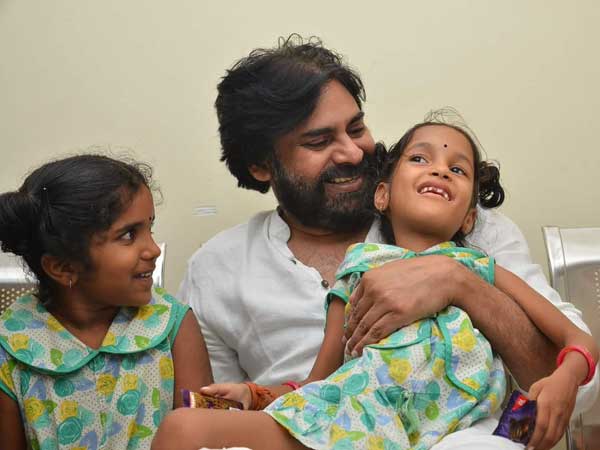 ఒడిలో కూర్చోబెట్టుకున్న పవన్..