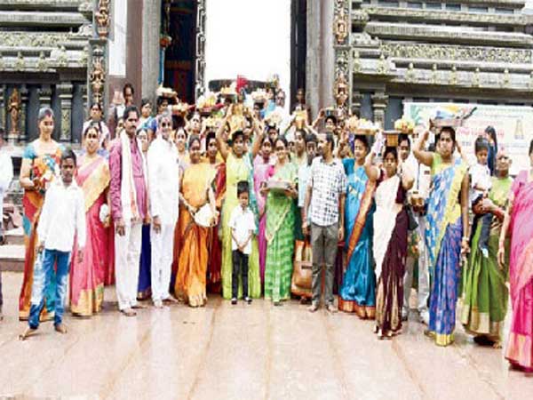 Temple employees families worship to Goddess Kanaka Durga for State prosperity Temple employees families worship to Goddess Kanaka Durga for State prosperity