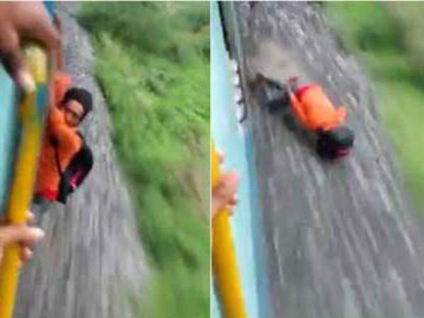 Stunt gone wrong: Video of youth hanging from train sparks rage online. Stunt gone wrong: Video of youth hanging from train sparks rage online.