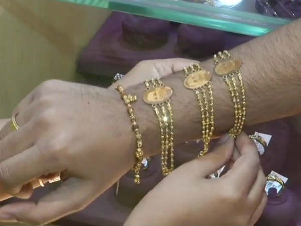 These golden Rakhis with Modi,Yogi photos are hot cakes in Surat
