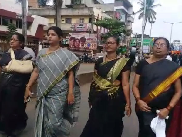 Karnataka former MLAs Sambhaji Patil and Manohar Kinekar celebrates a dark day in Belagavi.