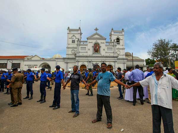 Sri Lanka detains Syrian in investigation of blasts; toll rises to 321