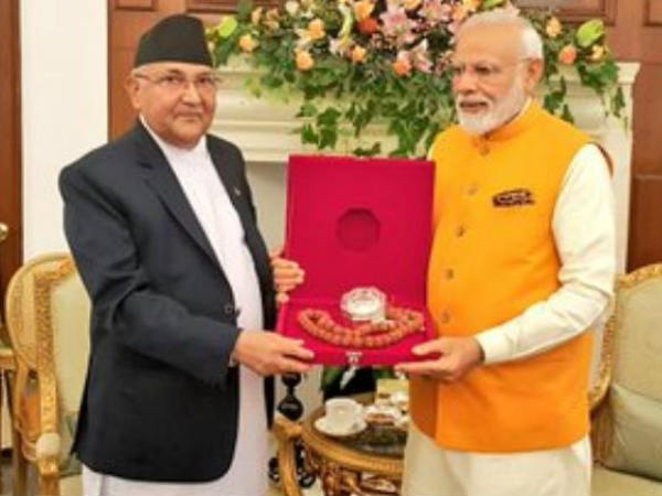 Nepal PM KP Sharma Oli gifts Rudraksh mala to PM Narendra Modi Nepal PM KP Sharma Oli gifts Rudraksh mala to PM Narendra Modi