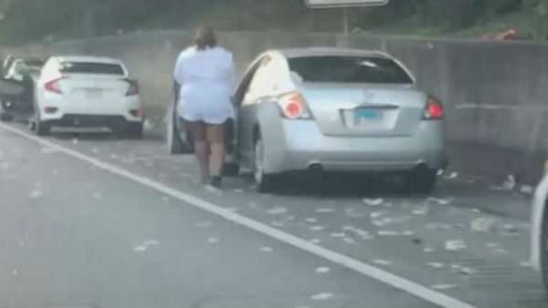 An armored vehicle spilled over $175,000 onto an highway outside Atlanta An armored vehicle spilled over $175,000 onto an highway outside Atlanta