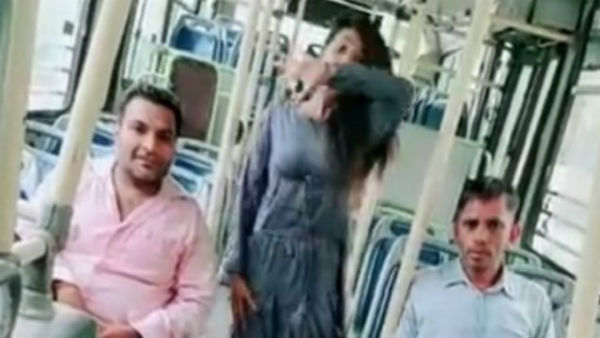 Delhi transport staff dancing with girl in bus face action