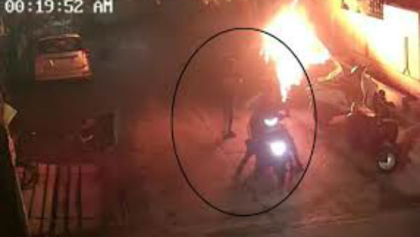 unknown persons set fire to car and some bikes at mid night in Vijayawada