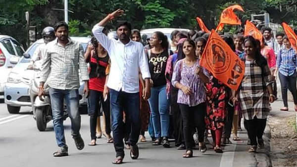 osmania university girl students protest against unknown person entry