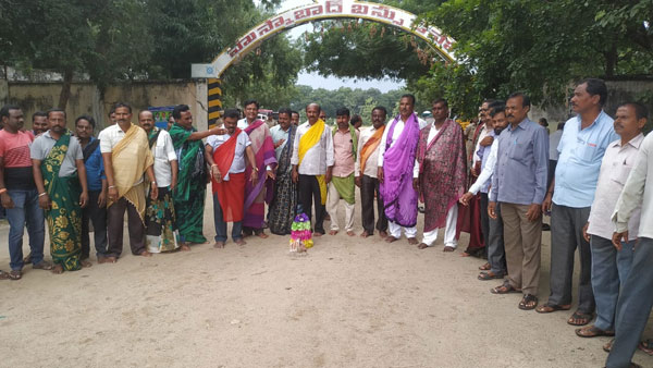 Husnabad TSRTCT employees played bathukamma in women dresses Husnabad TSRTCT employees played bathukamma in women dresses