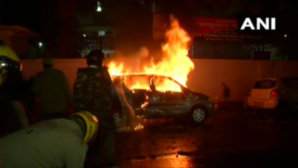 Police car set on fire, cops use water cannons against CAA protesters at Delhis Daryaganj