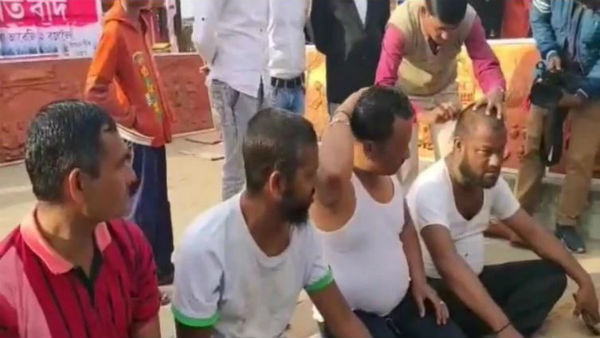  గుండు కొట్టించుకొని నిరసన