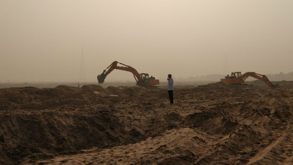 భూములపై ఎస్సై కన్ను..