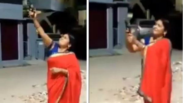 BJP women Leader in Uttar Pradesh Manju Tiwari Shoots in the Air to Drive Away Covid-19 BJP women Leader in Uttar Pradesh Manju Tiwari Shoots in the Air to Drive Away Covid-19
