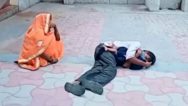 కొడుకు మృతదేహాన్ని గుండెలకు హత్తుకుని... కొడుకు మృతదేహాన్ని గుండెలకు హత్తుకుని...