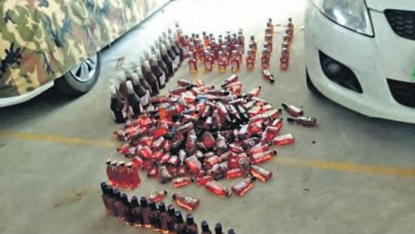 vijayawada kanakadurga temple board member resign after car caught with illegal liquor vijayawada kanakadurga temple board member resign after car caught with illegal liquor