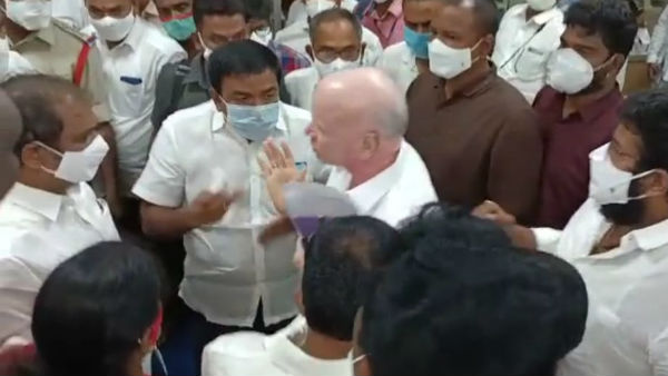 rukus in kakinada drc meeting, war of words between ysrcp mp and mla