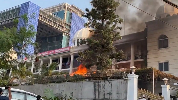 TRS Leader Kattela Srinivas Yadav Stir with a gun in Telangana Bhavan at fire accident