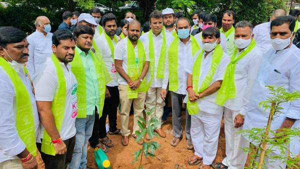 nri trs leaders sapling a plant at hyderabad dhulapally
