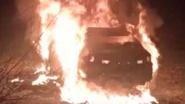 A car burnt in medak district: dead body in that car