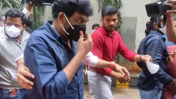 Tollywood director Puri Jagannadh arrives at ED office in Hyderabad in connection with a drugs case Tollywood director Puri Jagannadh arrives at ED office in Hyderabad in connection with a drugs case