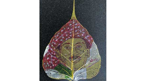 రావి ఆకుపై పెన్సిల్ షేడ్స్ తో జగన్ చిత్రం