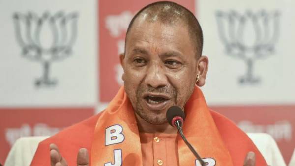  ప్రధాని మోదీ బొమ్మ, యోగి మంత్రం