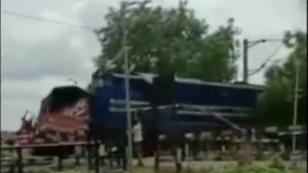 Viral video: Train colliding with truck captured on camera at a railway crossing in Karnataka Viral video: Train colliding with truck captured on camera at a railway crossing in Karnataka