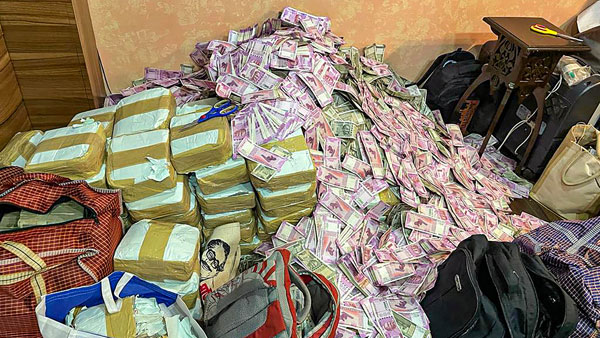 Rs 20 crore in cash found at home of Trinamool minister aide