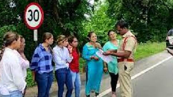 young Rajasthani women stopping motorists on the national highway and collecting money forcibly