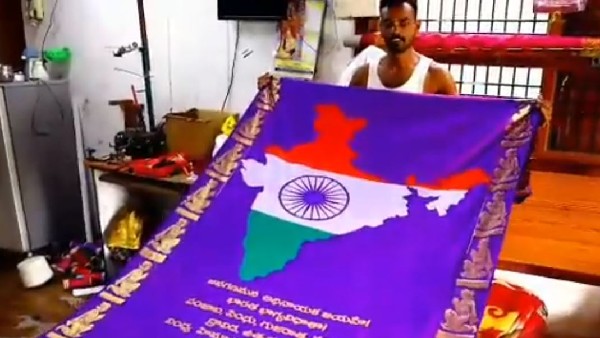 Telangana: Sircilla weaver Veldi Hari Prasad wove National Anthem on Silk Fabric Telangana: Sircilla weaver Veldi Hari Prasad wove National Anthem on Silk Fabric