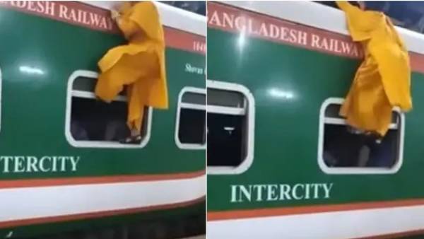 A video of a woman trying to climb a train is going viral on social media. A video of a woman trying to climb a train is going viral on social media.