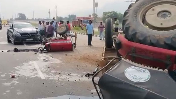 Tractor brokes into two pieces after collide with a Benz car near Tirupati 