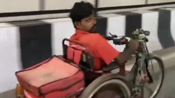 A video of Zomatos disabled delivery boy delivering food on a tricycle is going viral on social media A video of Zomatos disabled delivery boy delivering food on a tricycle is going viral on social media