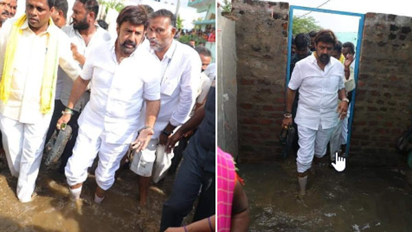 షూలు చేతపట్టుకుని వరద ప్రాంతాల్లో బాలకృష్ణ
